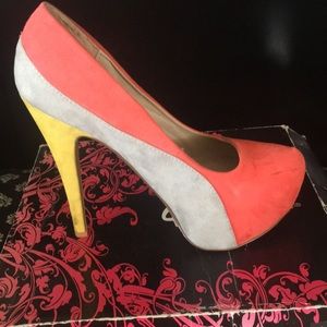 Coral and yellow suade pumps